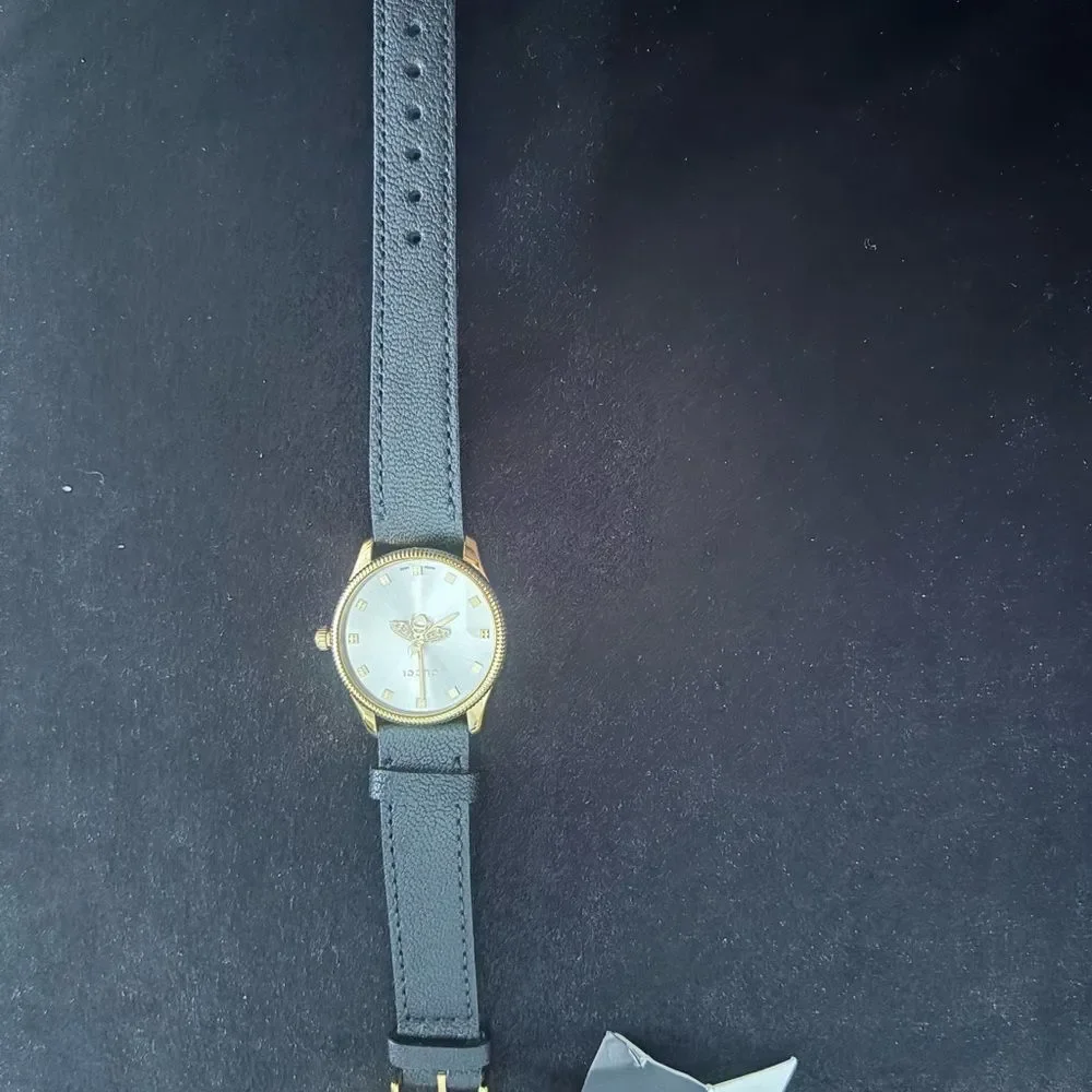 Brand new with box and dustbag Gucci Black and Gold Watch women's